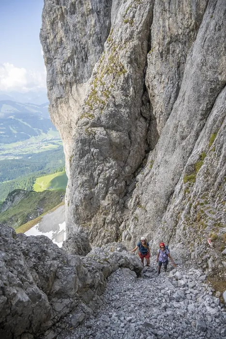 Framed Print : Two mountaineers with helmets climbing on a rock face Framed Print : Two mountaineers with helmets climbing on a rock face
