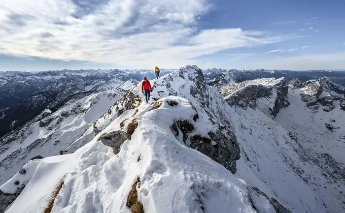 Framed Print : Two mountaineers on a narrow rocky snowy ridge