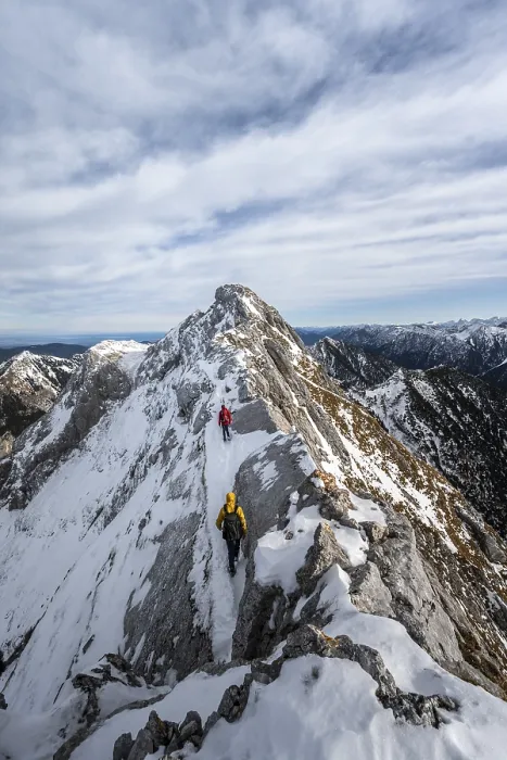 Framed Print : Two mountaineers on a rocky snowy ridge