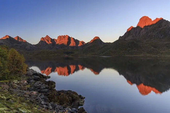 Framed Print : Mountains reflected in fjord, morning light