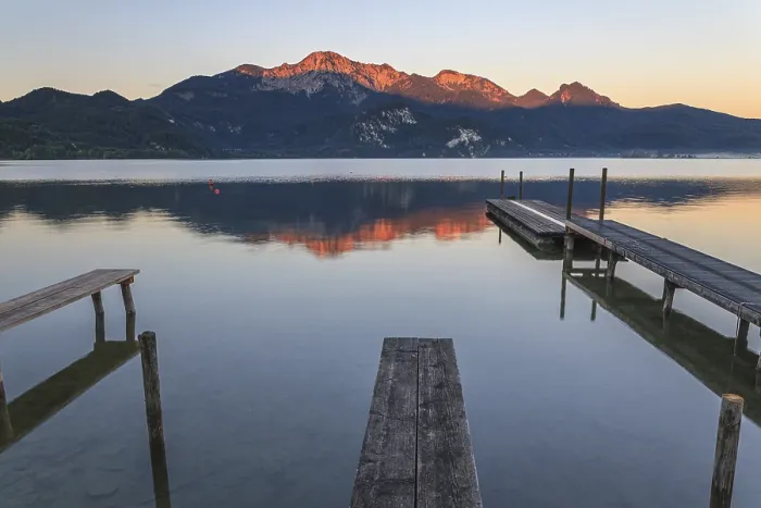 Framed Print : Mountains reflected in lake, footbridge