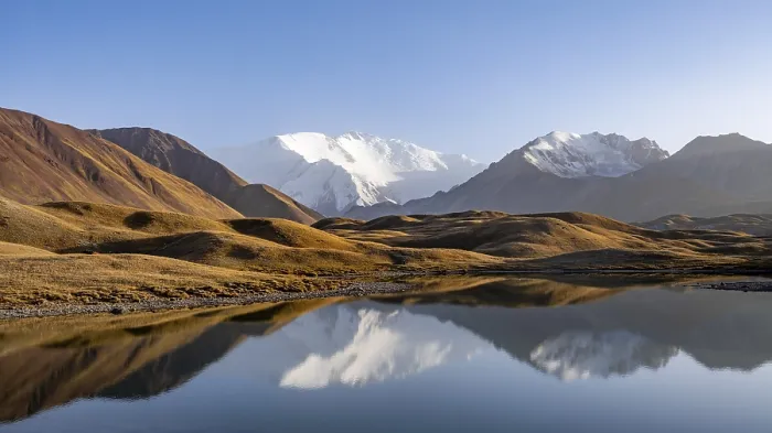 Framed Print : Mountains reflected in a small mountain lake