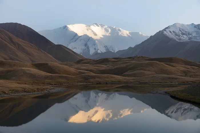 Framed Print : Mountains reflected in a small mountain lake Framed Print : Mountains reflected in a small mountain lake