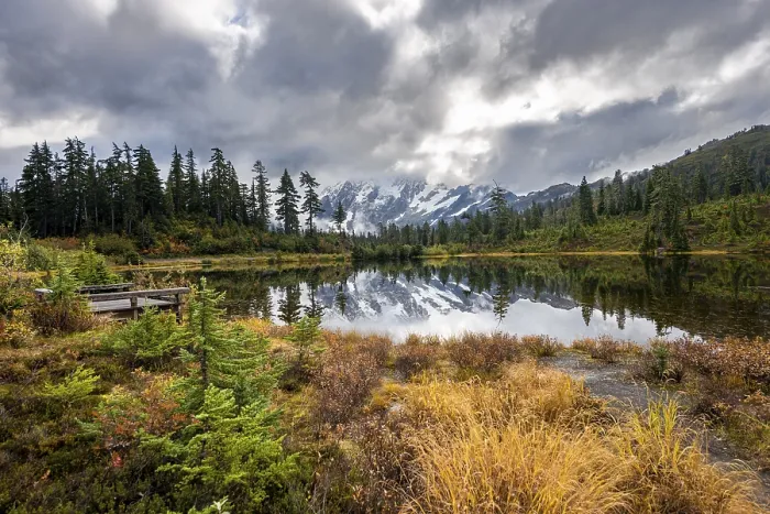 Framed Print : Mt. Shuksan in clouds, glacier with snow with reflection in Picture Lake