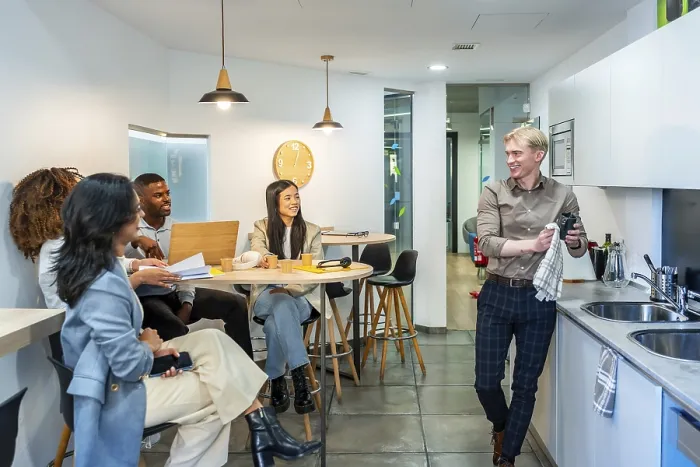 Framed Print : Multi ethnic colleagues enjoying coffee break