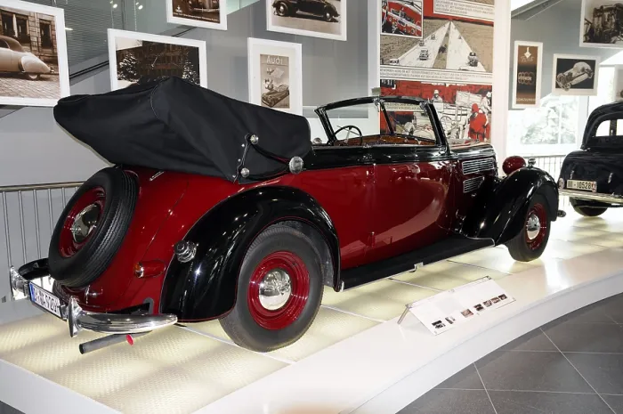 Framed Print : Museum mobile, Audi Museum, A red and black convertible classic car in a bright exhibition