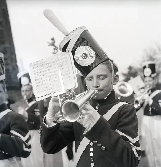 Framed Print : Music in the 1940s. Young boys in an orchestra is performing and playing outdoors