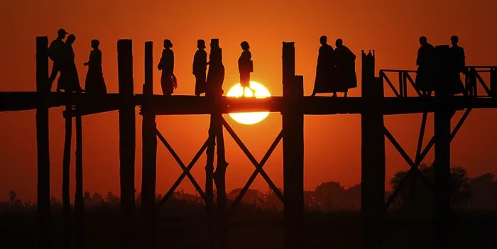 Framed Print : Myanmar, Wooden bridge at Inle Lake at sunset