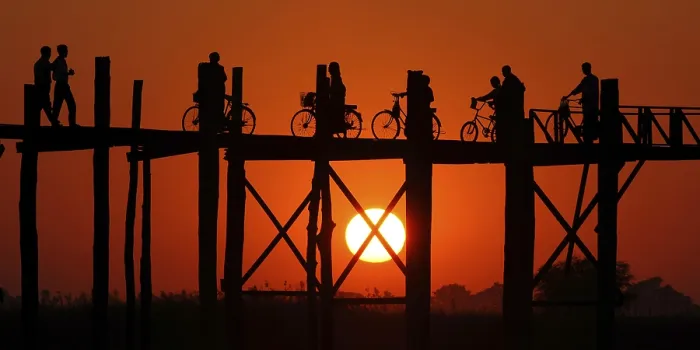 Framed Print : Myanmar, Wooden bridge at Inle Lake at sunset