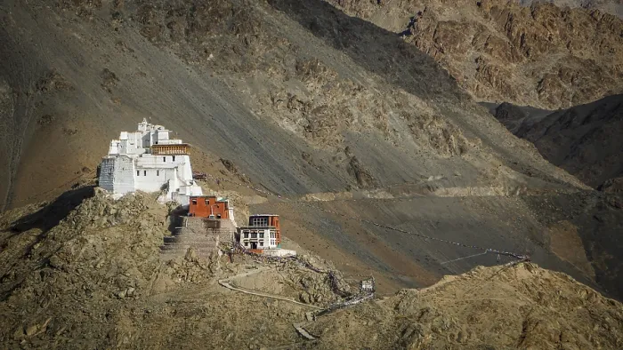 Framed Print : Namgyal Tsemo Buddhist monastery nestled in the barren mountains on a escarpment
