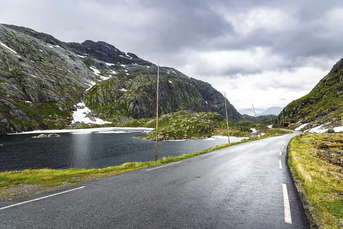 Framed Print : Narrow and dangerous mountain road glitters from the rain
