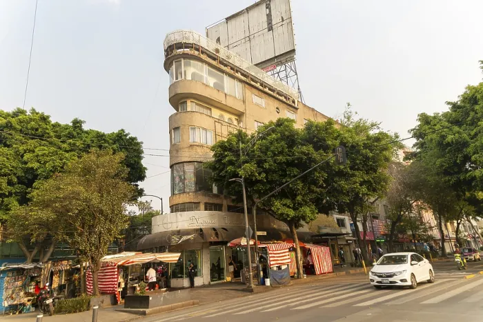 Framed Print : Narrow pointed building on corner of Avenue Insurgentes Sur