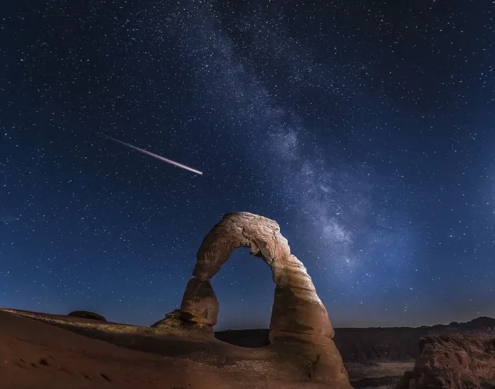 Framed Print : Natural Arch Delicate Arch with Milky Way and shooting star at night