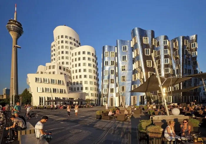 Framed Print : Neuer Zollhof with Gehry buildings and the Rhine Tower Framed Print : Neuer Zollhof with Gehry buildings and the Rhine Tower