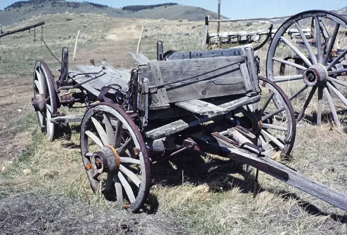 Framed Print : Nevada City historic ghost town, Montana, USA old broken down wooden wagons