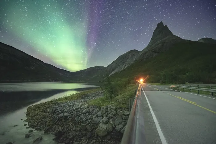 Framed Print : Night shot of (Aurora borealis) a road with illuminated entrance to the tunnel