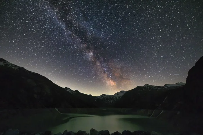 Framed Print : Night sky with Milky Way over mountains and a calm lake in the foreground