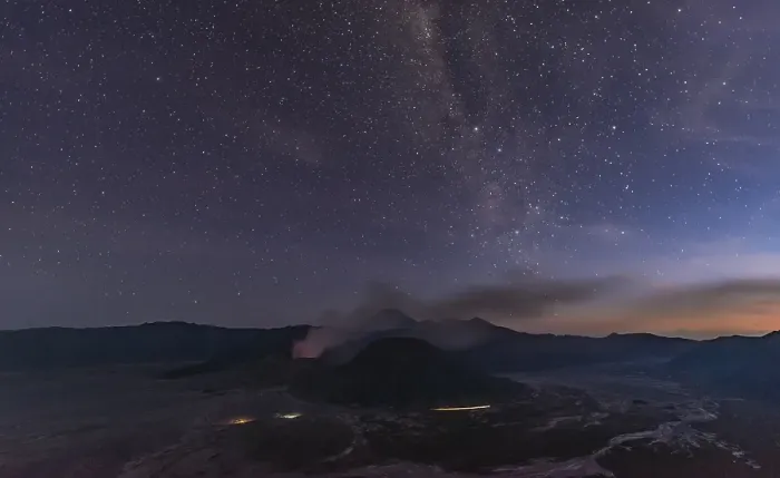 Framed Print : Night sky with stars, smoking volcano Mount Gunung Bromo