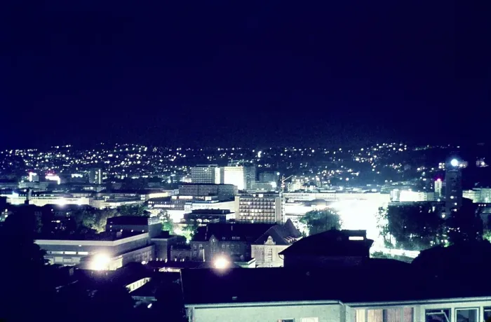 Framed Print : Night view of city centre of Stuttgart, Germany, early 1960s illuminated by electric neon lights, Europe Framed Print : Night view of city centre of Stuttgart, Germany, early 1960s illuminated by electric neon lights, Europe