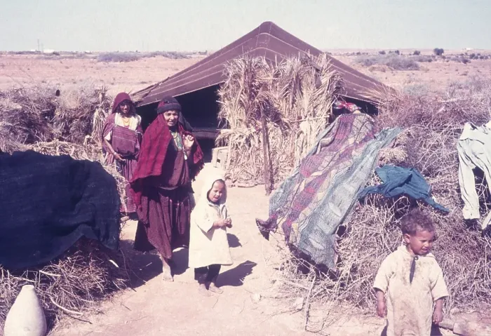 Framed Print : Nomadic Bedouin people by their desert tent in North Africa
