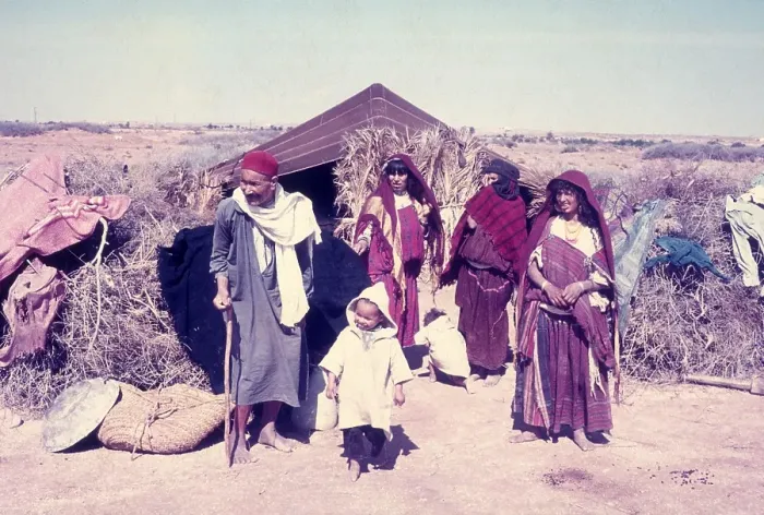 Framed Print : Nomadic Bedouin people by their desert tent in North Africa Framed Print : Nomadic Bedouin people by their desert tent in North Africa