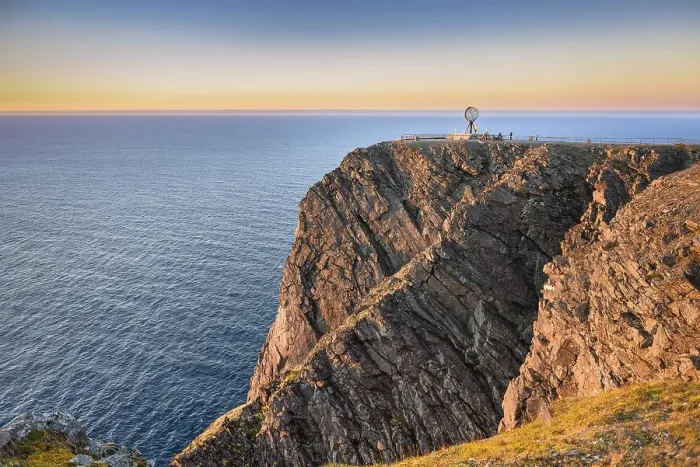 Framed Print : North Cape cliff with steel globe in the light of the midnight sun