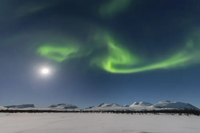 Framed Print : Northern Lights (Aurora Borealis) at full moon over snow-covered mountains