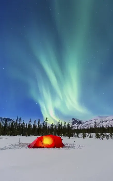 Framed Print : Northern Lights (Aurora borealis) above a red illuminated tent in winter