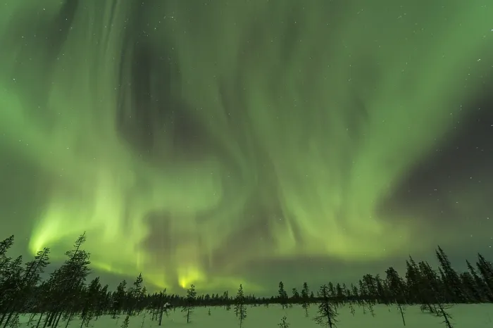 Framed Print : Northern Lights (Aurora borealis) over snowy landscape