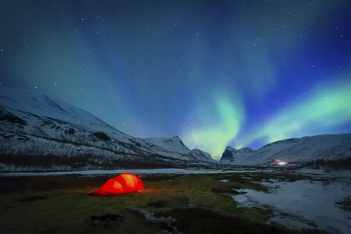 Framed Print : Northern Lights (Aurora borealis) over a tent in winter