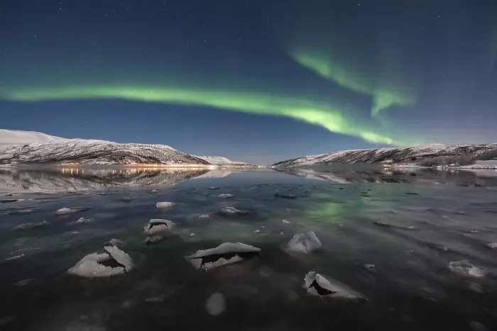 Framed Print : Northern lights over fjord with ice floes