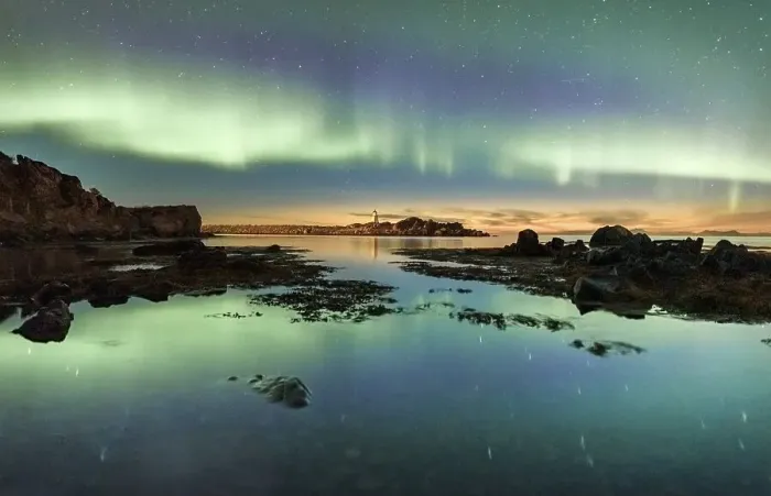 Framed Print : Northern lights over the sea, island with small lighthouse Framed Print : Northern lights over the sea, island with small lighthouse