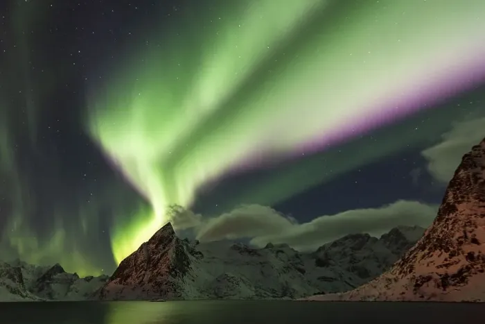 Framed Print : Northern lights over snow-capped mountains Framed Print : Northern lights over snow-capped mountains