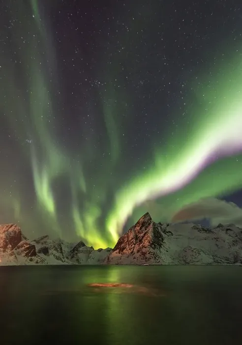 Framed Print : Northern lights over snow-capped mountains