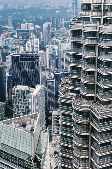 Framed Print : Nov 20, 2019 - Kuala Lumpur, Malaysia: Contemporary downtown cityscape with close up of iconic Petronas Towers facade Framed Print : Nov 20, 2019 - Kuala Lumpur, Malaysia: Contemporary downtown cityscape with close up of iconic Petronas Towers facade