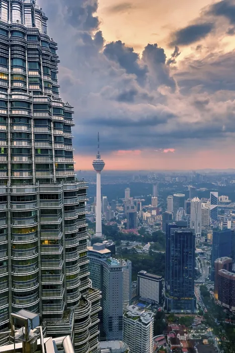 Framed Print : Nov 20, 2019 - Kuala Lumpur, Malaysia: Petronas Twin Tower and Menara KL tower at dramatic sunset sky