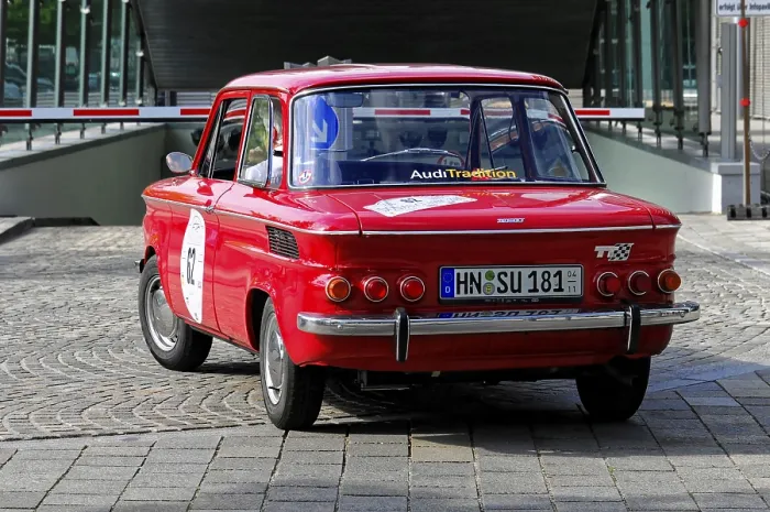 Framed Print : NSU TTS, red classic car on cobblestone road during a car race