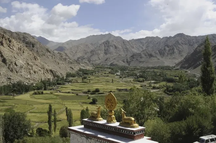 Framed Print : Oasis and Phiyang Monastery with Buddhist symbols on the monastery Framed Print : Oasis and Phiyang Monastery with Buddhist symbols on the monastery