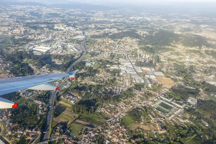 Framed Print : Oblique aerial view from plane window over city of Porto