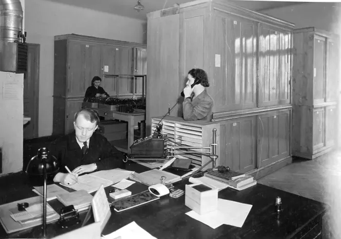 Framed Print : Office, man at the desk, secretary on the phone