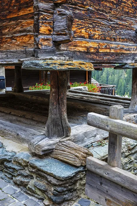 Framed Print : Old barn on wooden supports and stone slabs