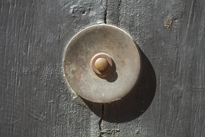 Framed Print : Old bell on a half-timbered house in the old town centre
