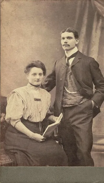 Framed Print : Old black and white photo, young couple in photo studio around 1910