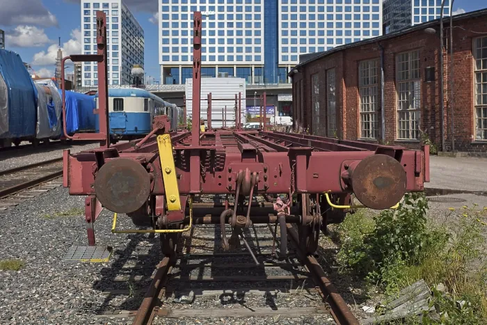 Framed Print : Old freight train car standing at railway yard in summer