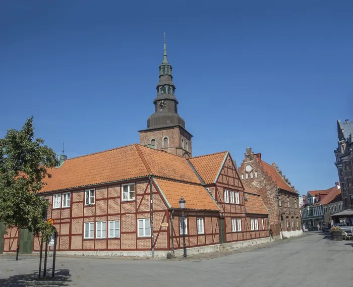 Framed Print : Old half-timbered building from the 18th century with St