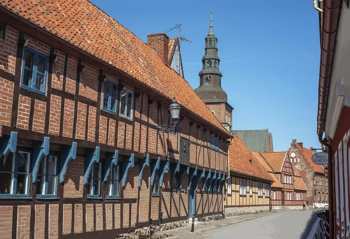 Framed Print : Old half-timbered building from the 18th century with St Framed Print : Old half-timbered building from the 18th century with St