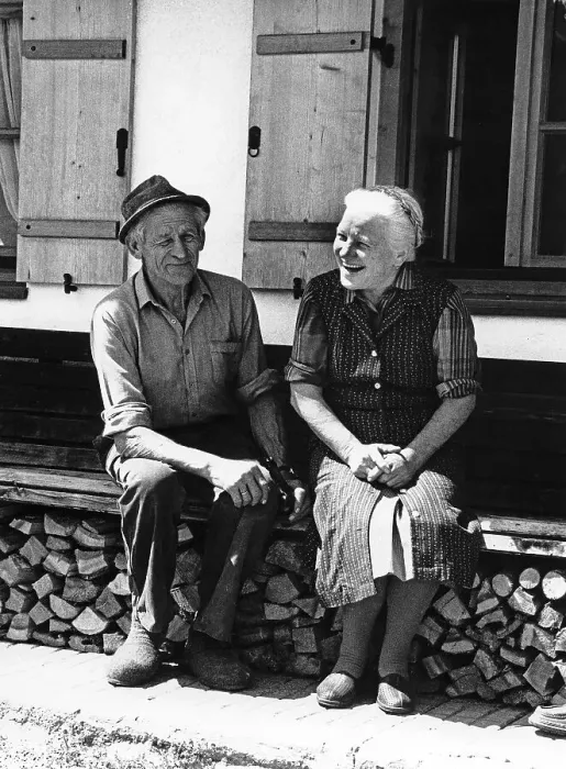 Framed Print : Old happy couple on the house bank in front of the farm Framed Print : Old happy couple on the house bank in front of the farm