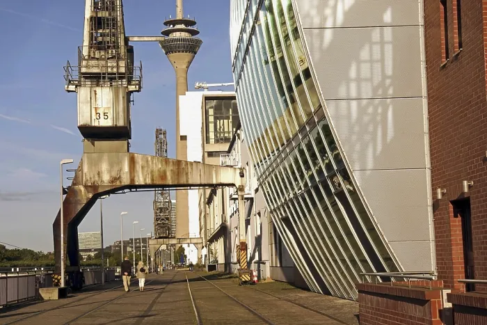 Framed Print : Old harbour crane and modern architecture