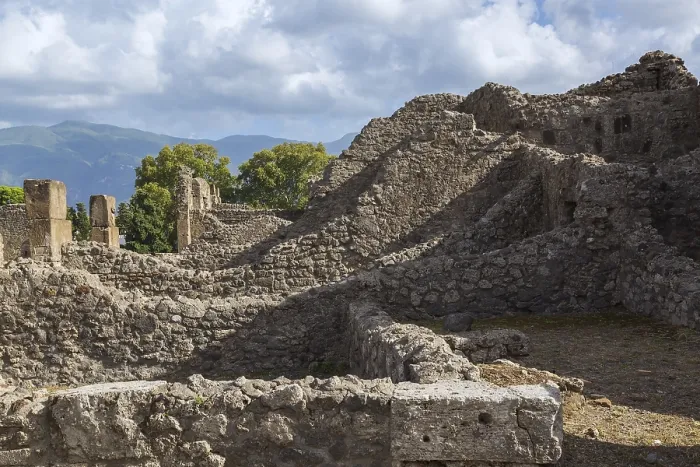 Framed Print : Old stone wall structures of varying heights and remnants of residential buildings at the ancient ruins of Pompeii Framed Print : Old stone wall structures of varying heights and remnants of residential buildings at the ancient ruins of Pompeii