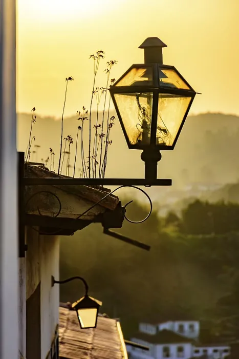Framed Print : Old street lighting with lantern in colonial style during sunset in the city of Ouro Preto